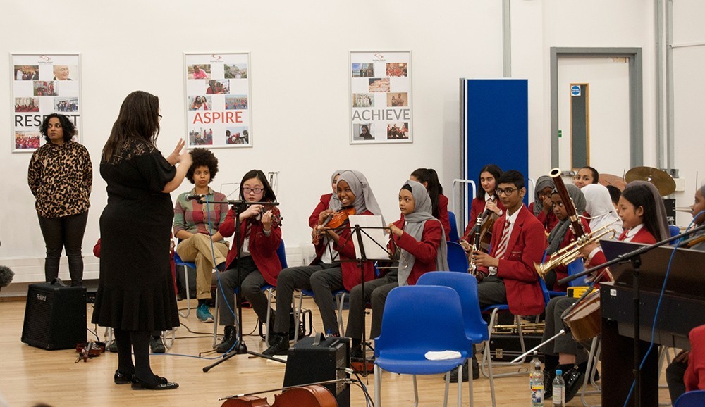 Swanlea students perform as a small orchestra