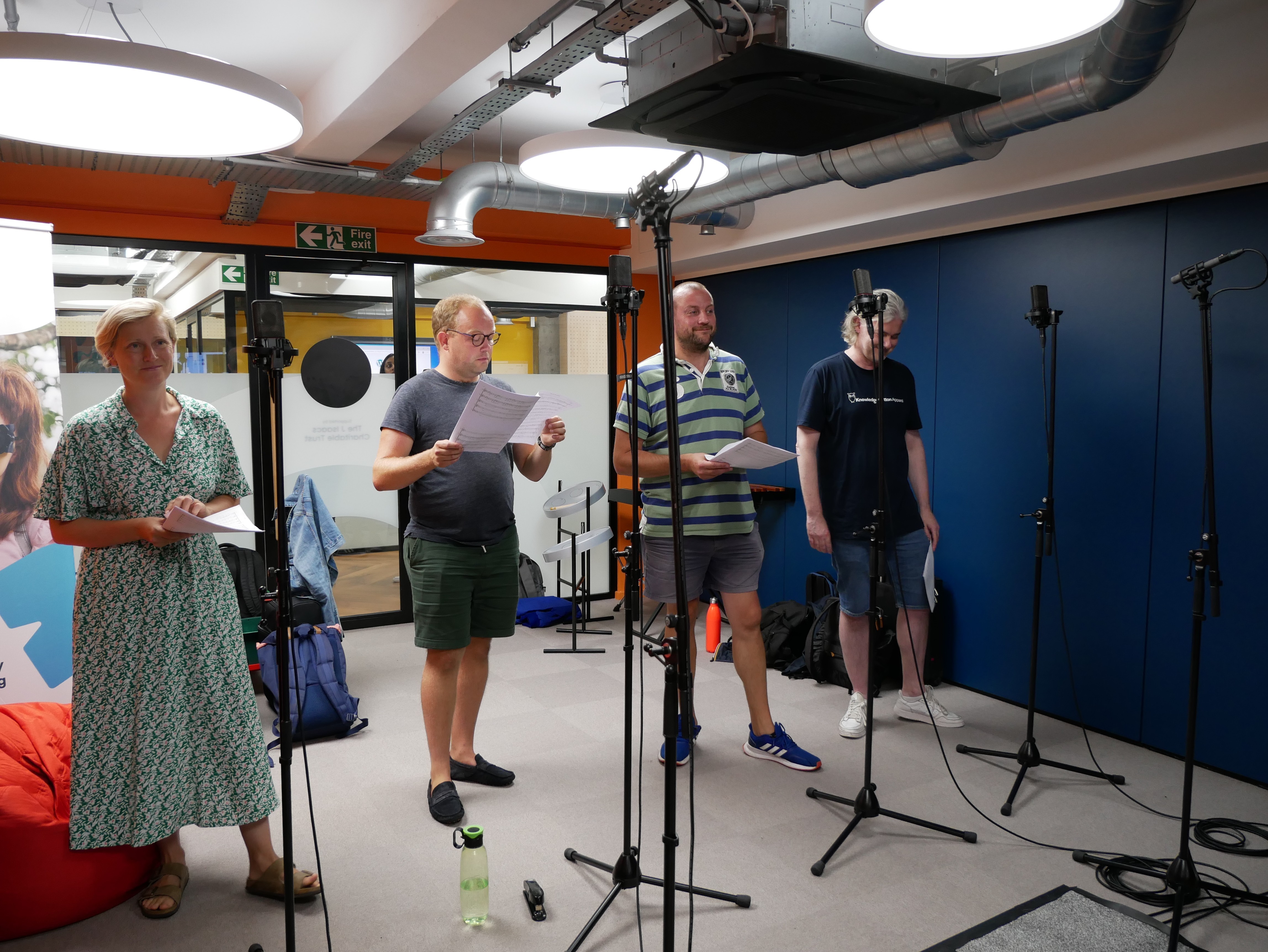 Members of The Sixteen choir recording the young people's piece.